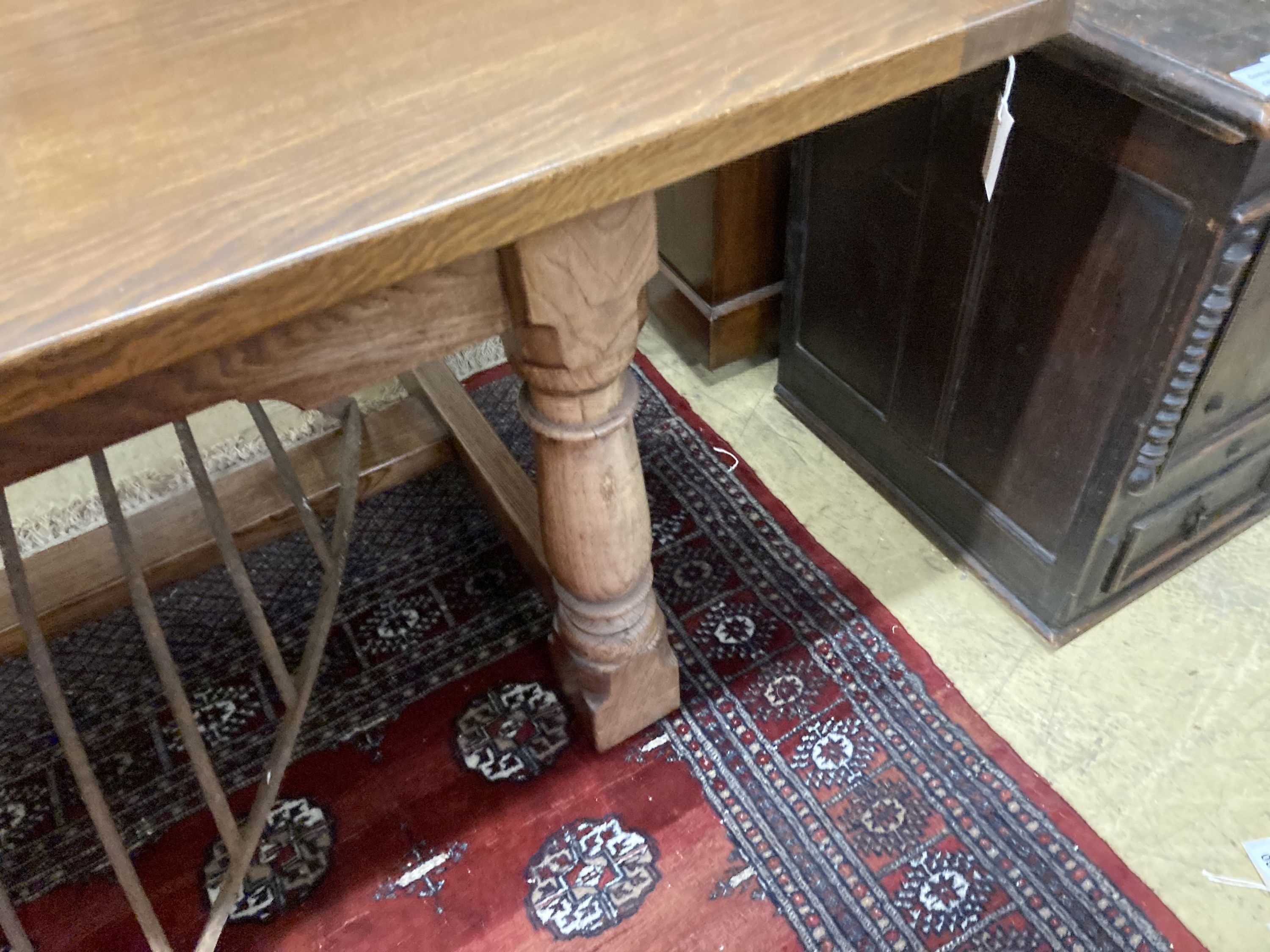 An 18th century style oak rectangular refectory dining table, length 277cm, width 109cm, height 76cm